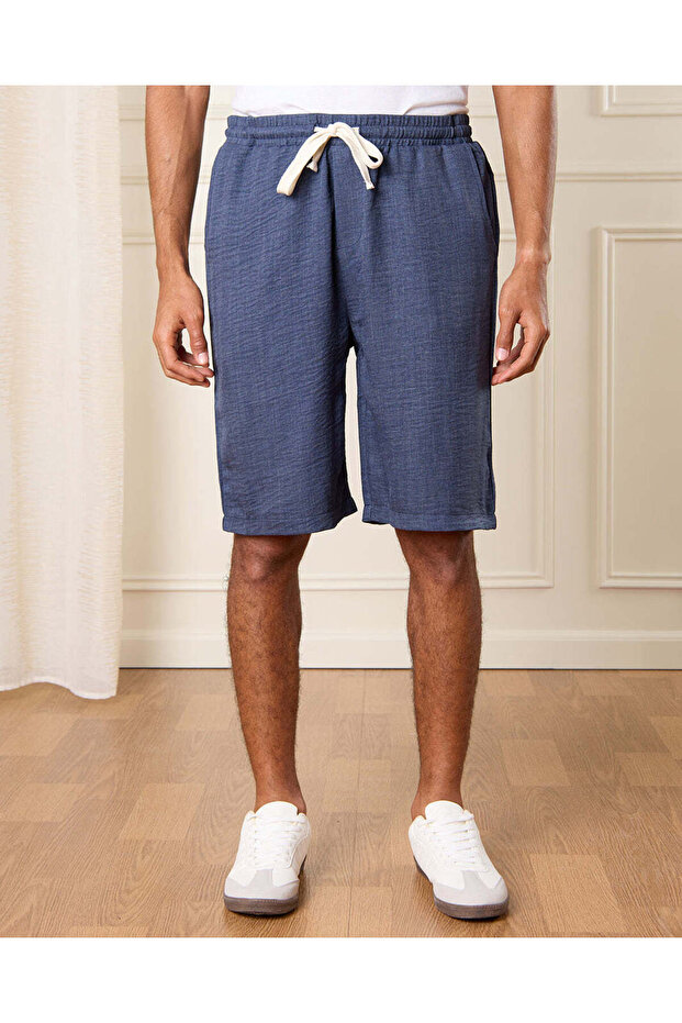 شورت رجالي للاسترخاء بلون أزرق داكن - 1