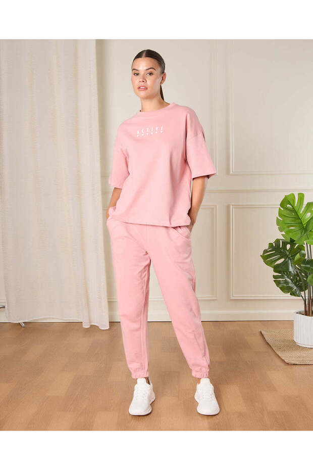 بنطلون رياضي نسائي سادة باللون الوردي - 2
