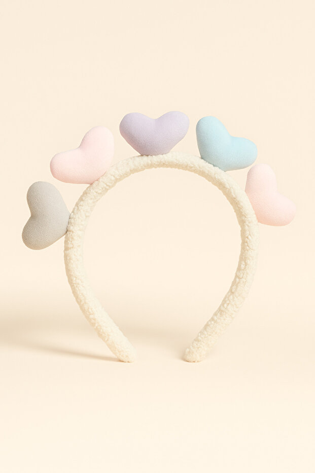 White crown with small heart accessory for children
