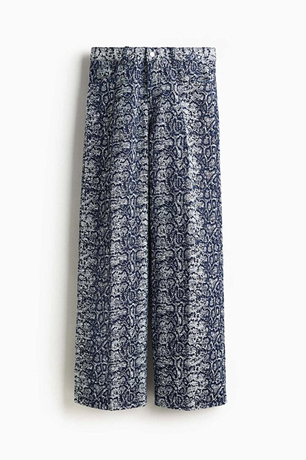 Crease-leg bouclé denim jeans