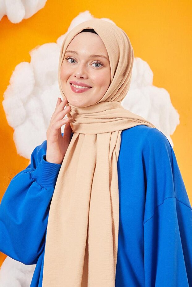 شال كاز من القطن باللون الأصفر الداكن