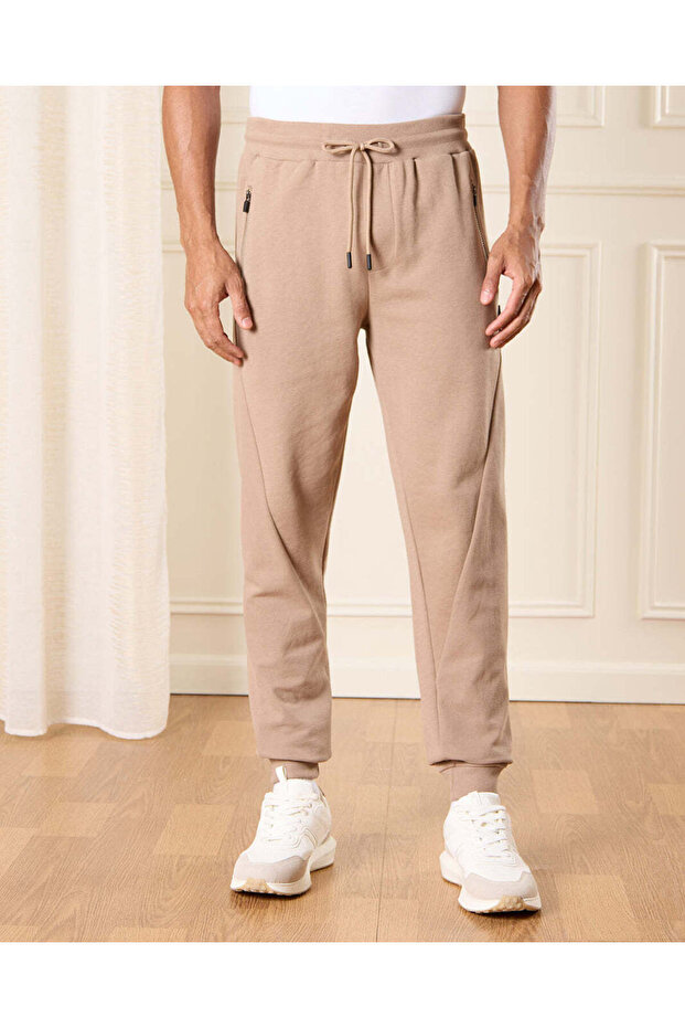 بنطال رياضي رجالي سادة باللون البيج - 1