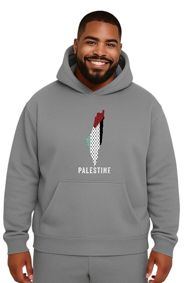 سترة رياضية كبيرة الحجم مطبوعة عليها كلمة فلسطين للجنسين