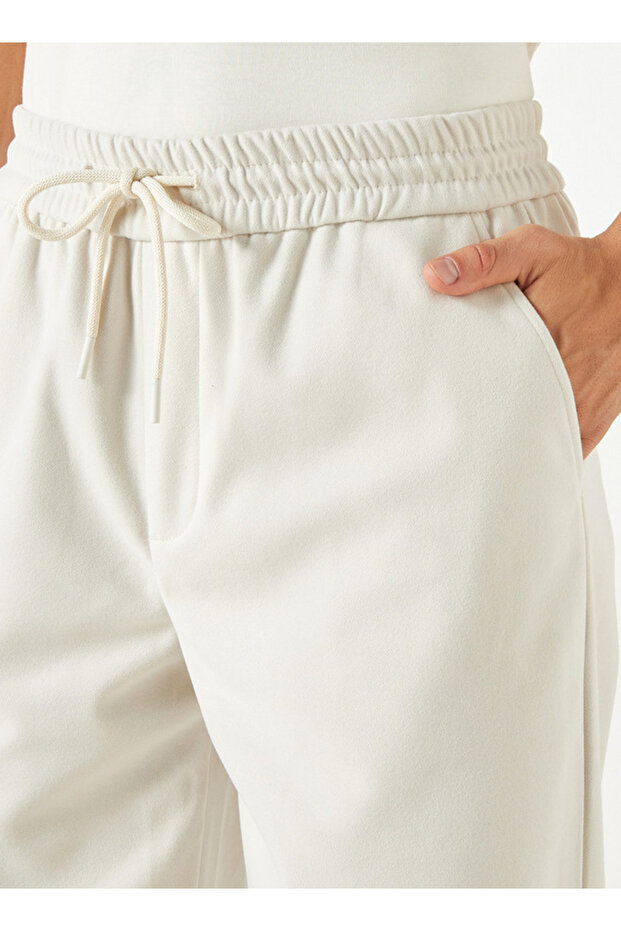 بنطال ركض بقصة عادية مع خصر قابل للتمدد وجيب - 4