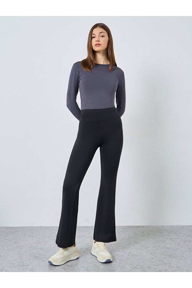 Women Black Solid Plain Flared Leggings