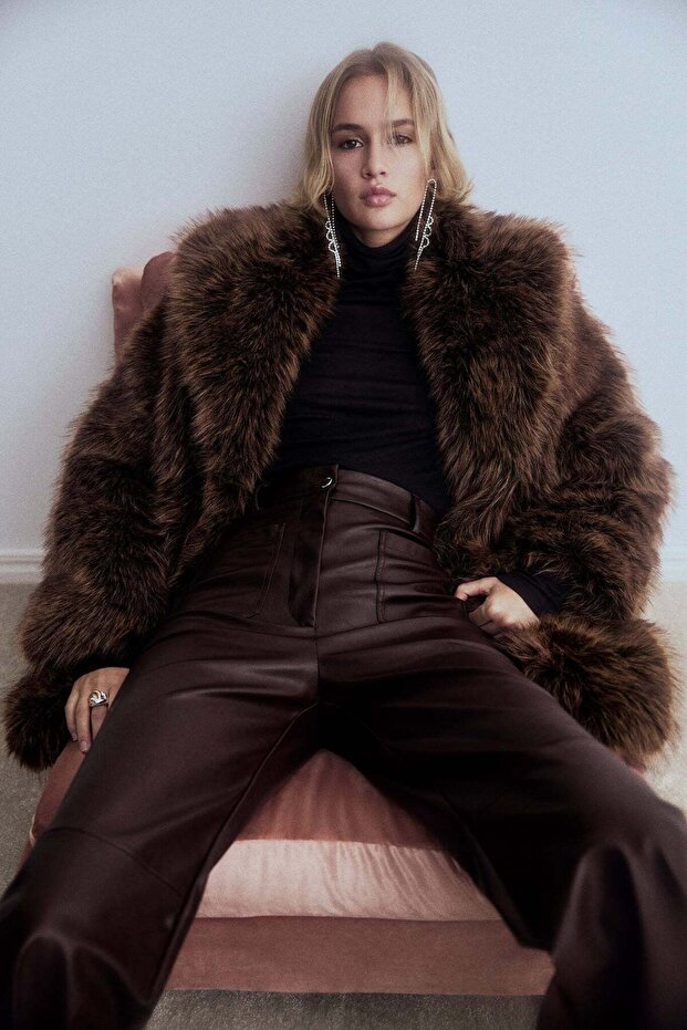 Flared coated trousers