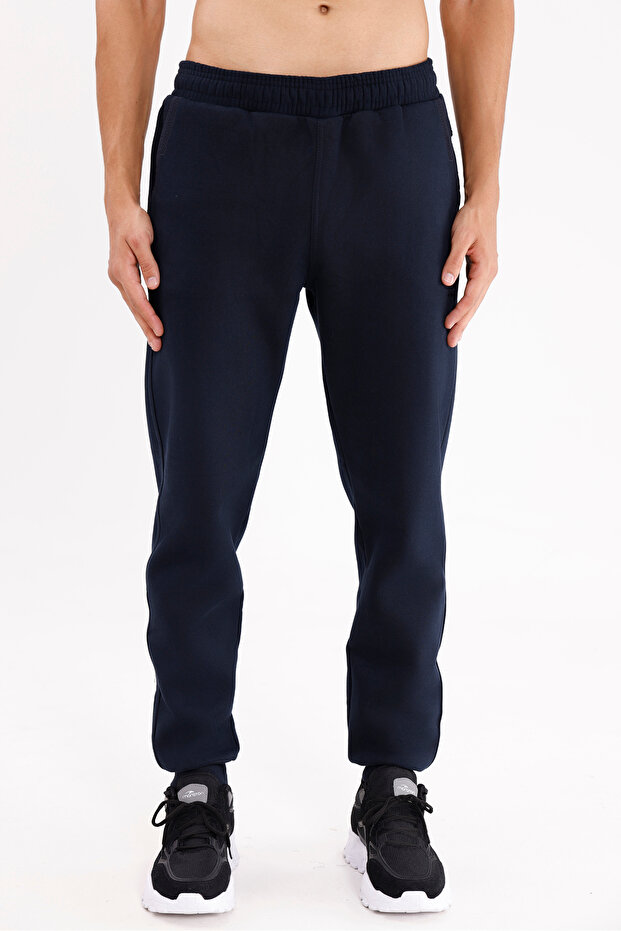 Flexible Waistband, Side Pockets, Flap Back Pocket, Tonal Logo, Comfortable Fit, Straight Leg Sweatpants