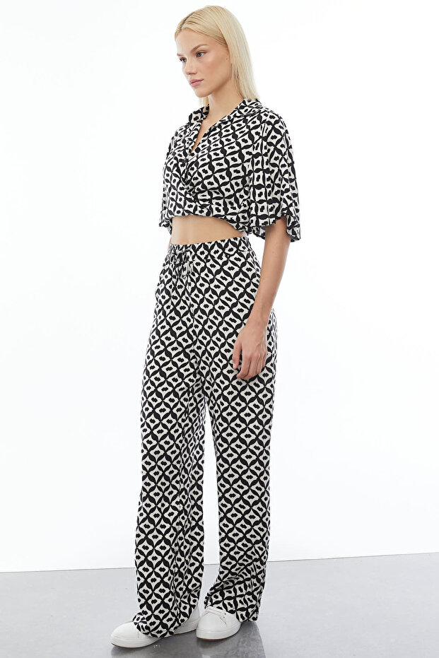 بنطلون بحزام مزين بنقوش - 4