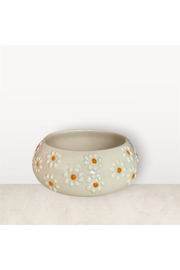 وعاء منقوش عليه زهرة الأقحوان - 1