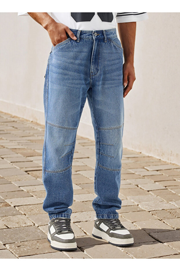 بنطلون جينز مقسم إلى أجزاء مع جيوب - 1