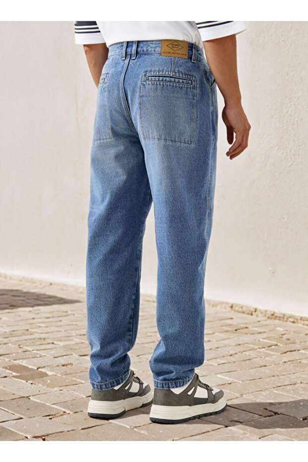 بنطلون جينز مقسم إلى أجزاء مع جيوب - 3