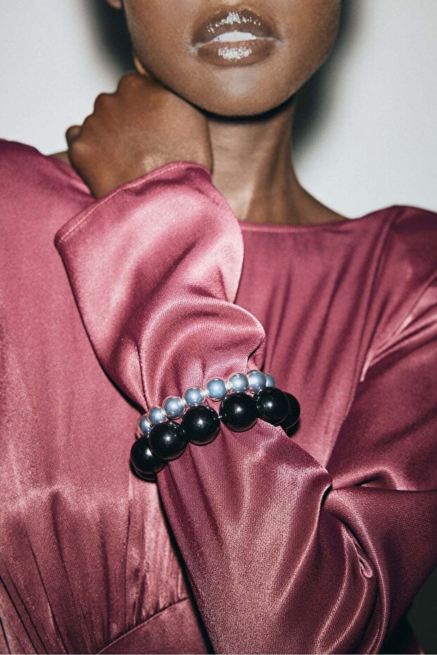 مجموعة من سوارين من الخرز - 1