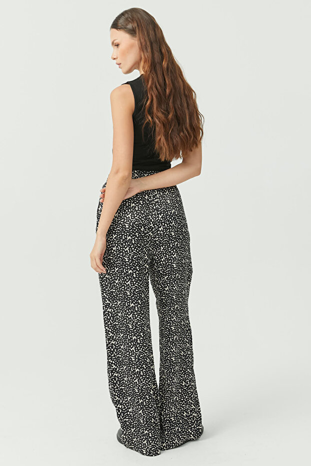Pantaloni de damă cu model leopard - 6