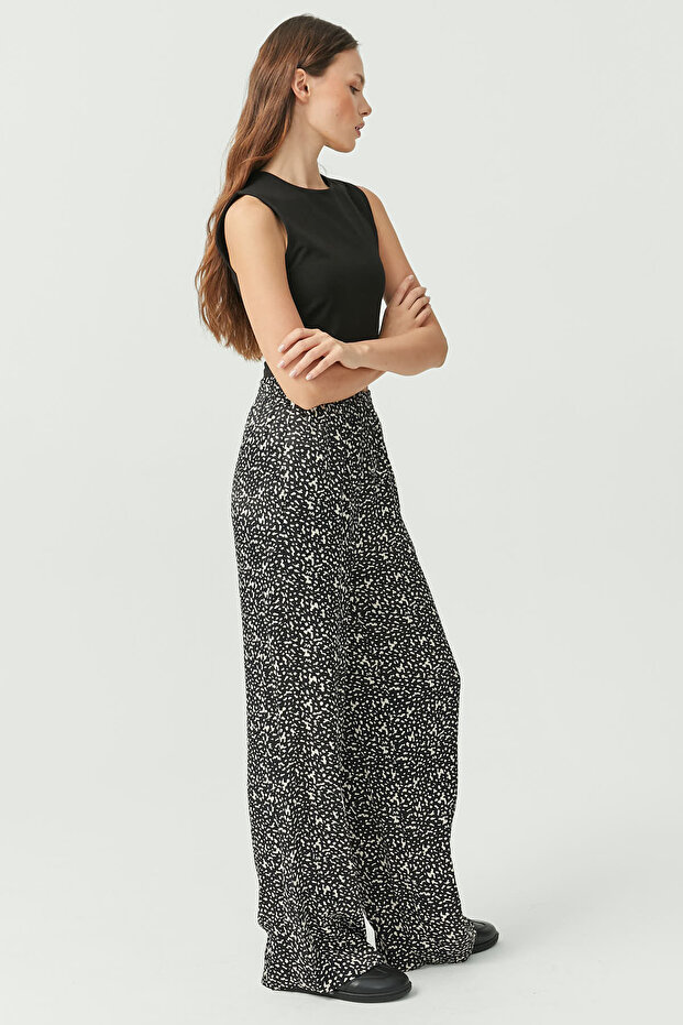 Pantaloni de damă cu model leopard - 7