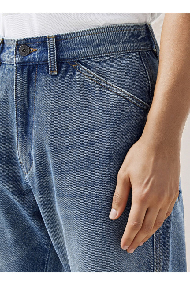 بنطلون جينز مقسم إلى أجزاء مع جيوب - 4