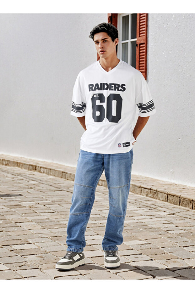 بنطلون جينز مقسم إلى أجزاء مع جيوب - 2