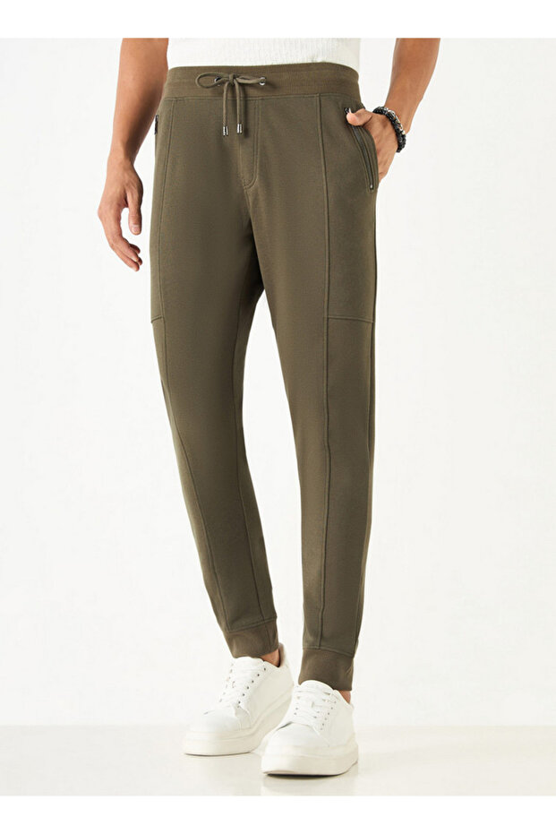 بنطال رياضي منسوج بإغلاق برباط وجيوب - 1