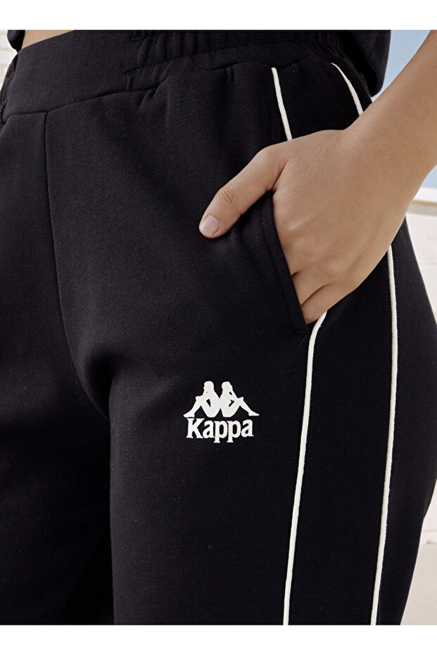 بنطال رياضي بطبعة شعار - 4