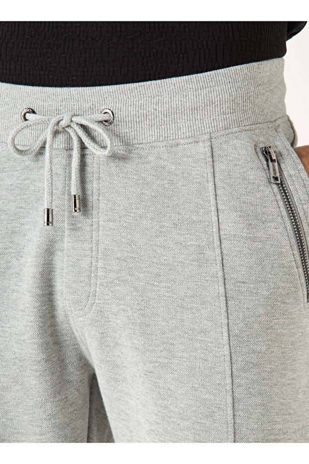 بنطال رياضي منسوج بإغلاق برباط وجيوب - 4