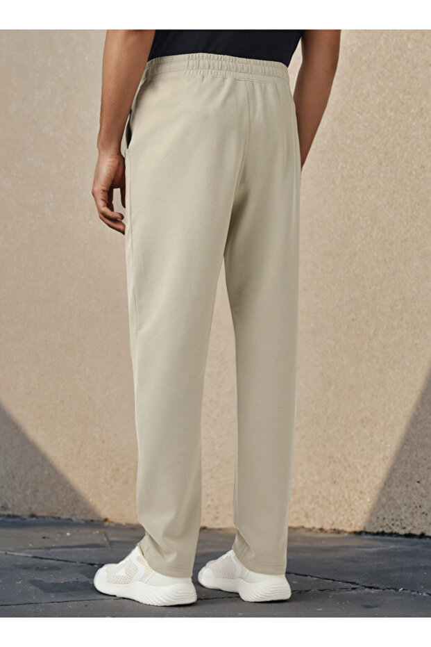 بنطال رياضي بشعار منقوش وجيوب - 3