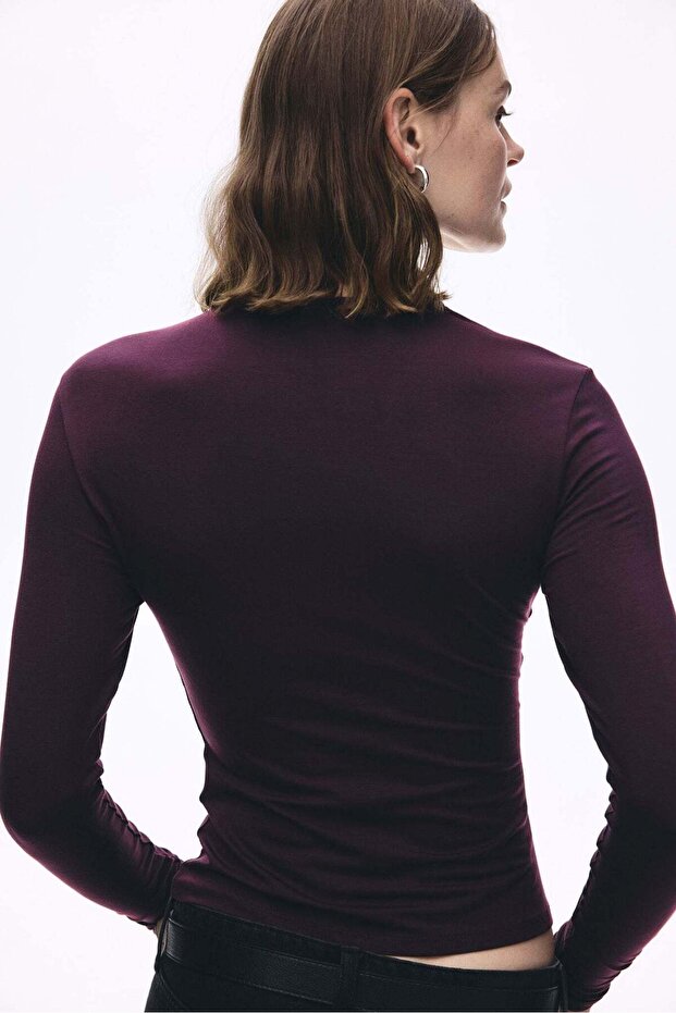 Draped asymmetric top
