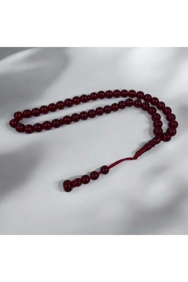 مسبحة خرز بلون العود