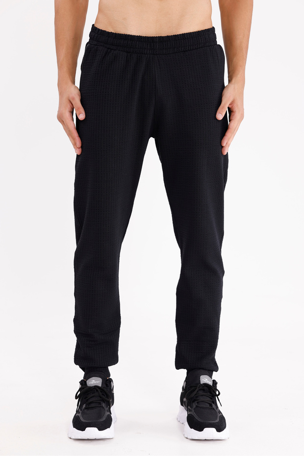 Honeycomb Patterned Elastic Waist Side Pockets Narrow Leg Sports Sweatpants
