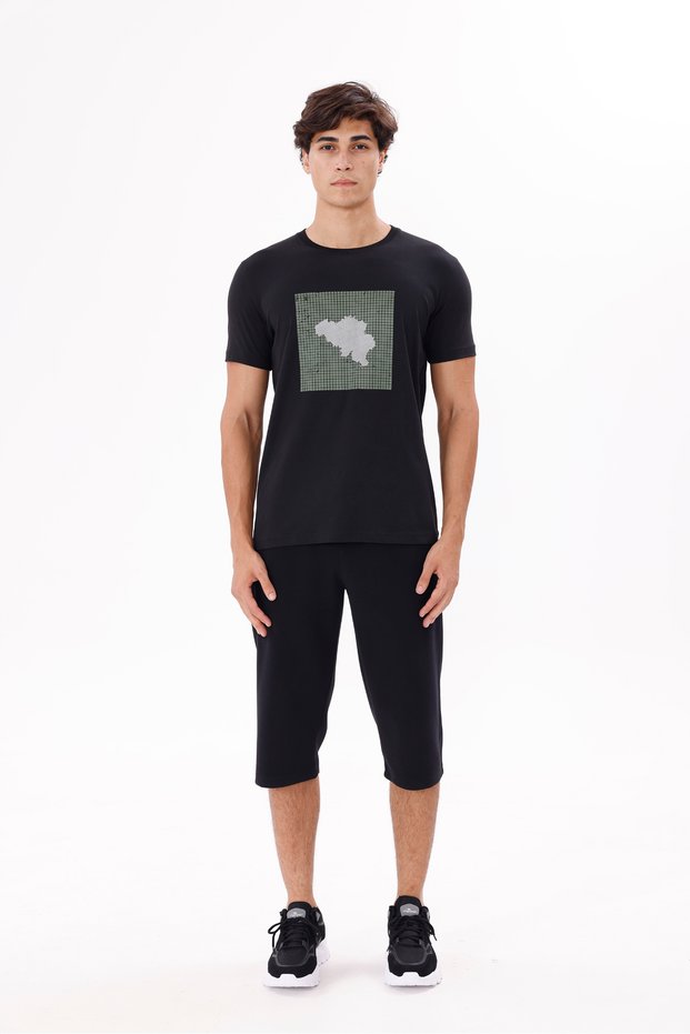 Silhouette of Printed Bicycles on a Square Grid Floor Comfortable Fit Short Sleeve T-Shirt