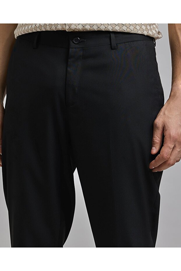 بنطلون ضيق سادة مع إغلاق بأزرار - 4