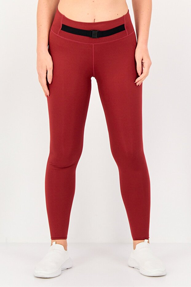 بنطال رياضي نسائي بشعار ماركة Dri Fit، لون عنابي