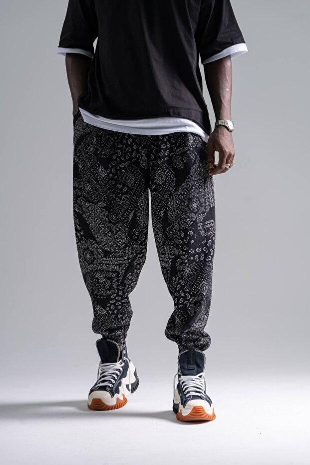 بنطلون شالوار منقوش بخصر مطاطي - 1