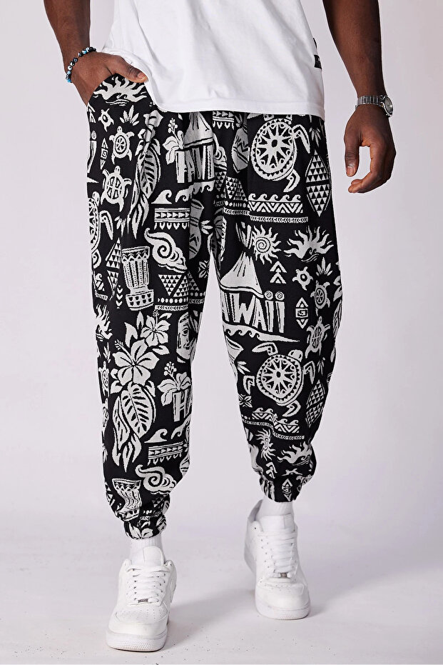 بنطلون شالوار منقوش بخصر مطاطي - 1