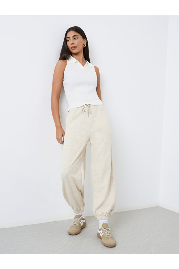 Cream Solid Cuffed Joggers - 1