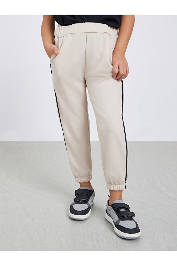 Girls Beige Solid Joggers with Side Binding