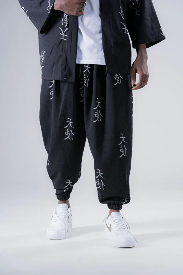 بنطلون شالوار منقوش بخصر مطاطي - 1