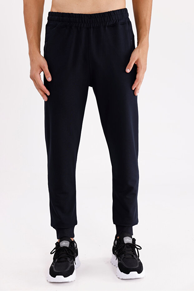 Melange Textured Elastic Waist Side Pockets Single Back Pocket Skinny Leg Sweatpants