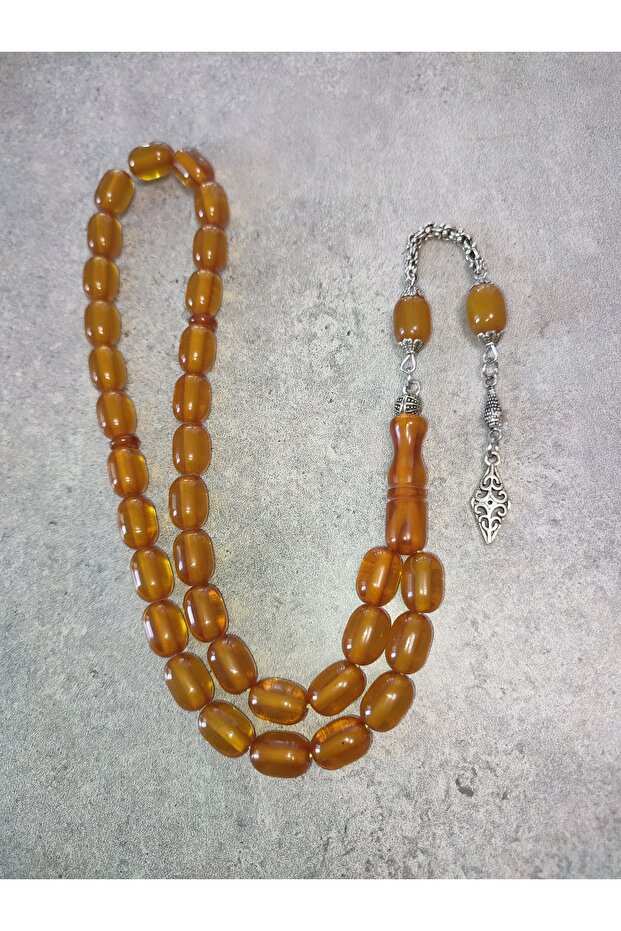 Capsule Cut 9X12 mm Tasseled Stick Crimped Amber Prayer Beads