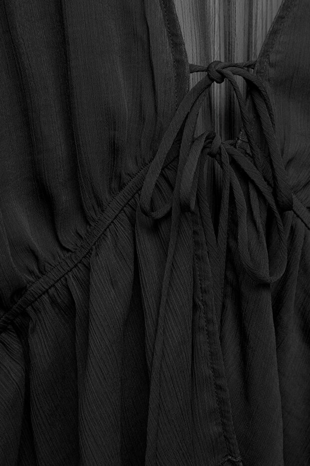 بلوزة فضفاضة مع كشكشة - 7