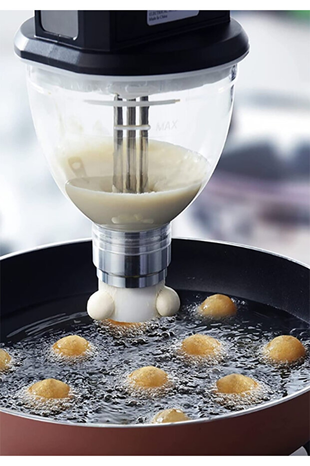 An electric device that makes preparing dumplings quick and efficient using three openings to make balls in one go - 6