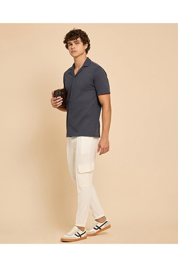 بنطلون رياضي كارجو سادة مع خصر برباط - 1