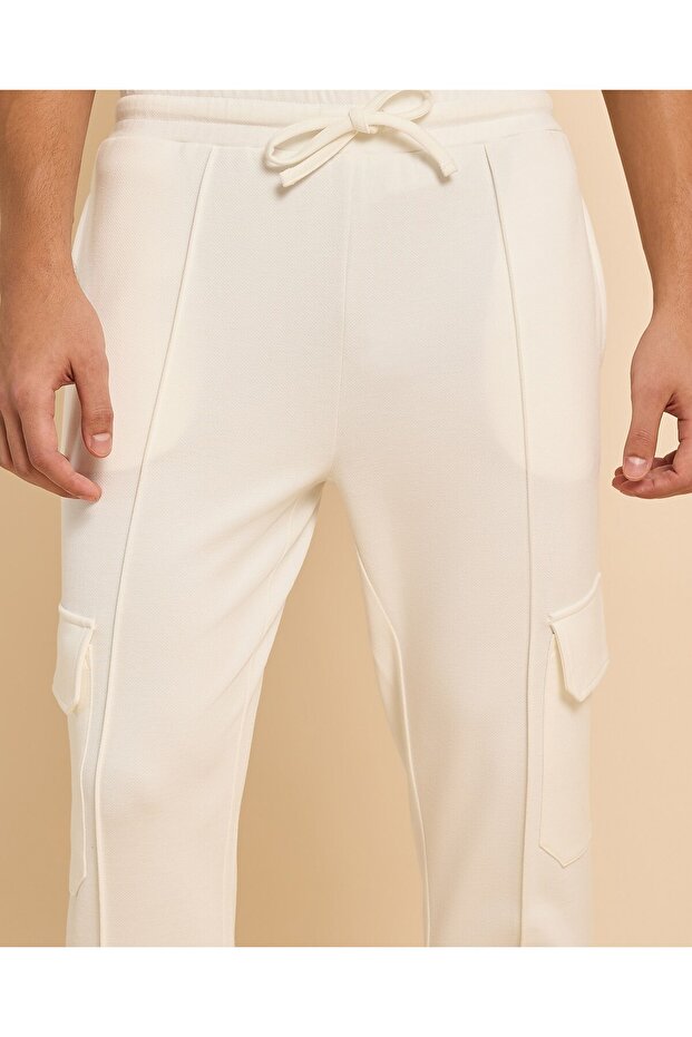 بنطلون رياضي كارجو سادة مع خصر برباط - 6