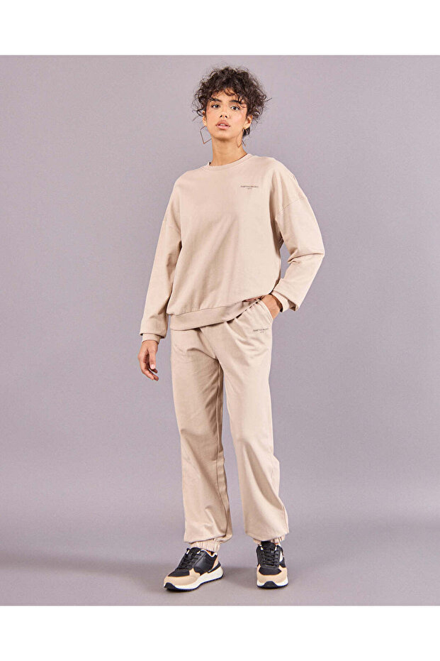 بنطال رياضي نسائي سادة باللون البيج - 2