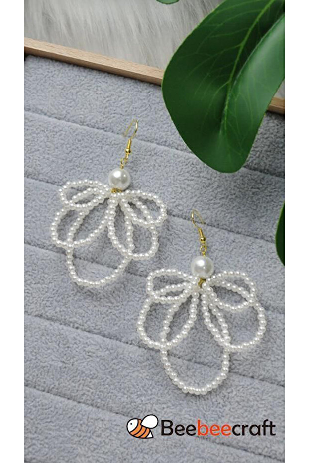 Women's Earrings with Pearl and Bow Design