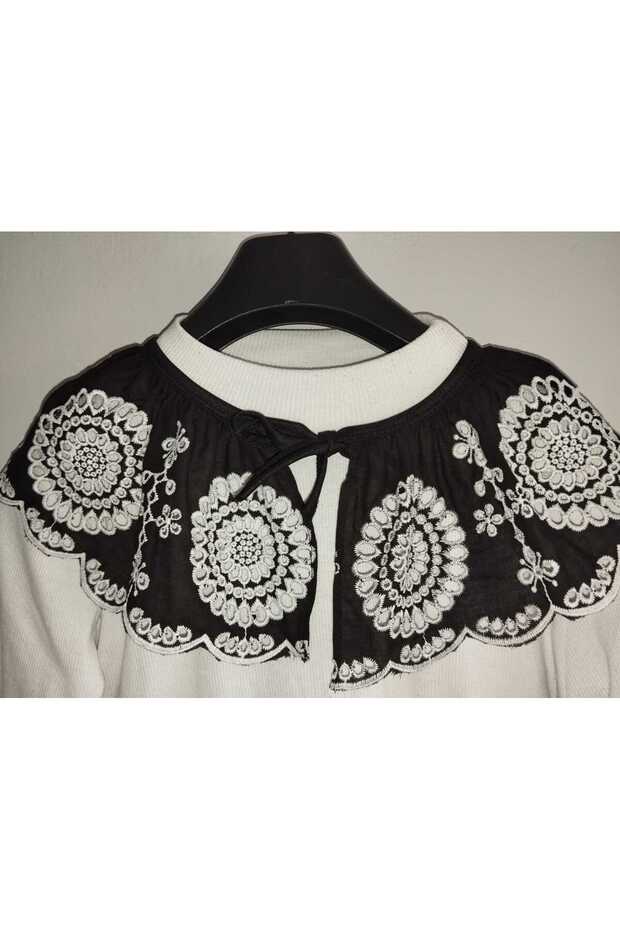 طوق أبيض وأسود - 1