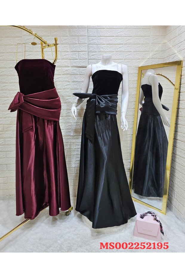 An elegant evening dress with a soft tie