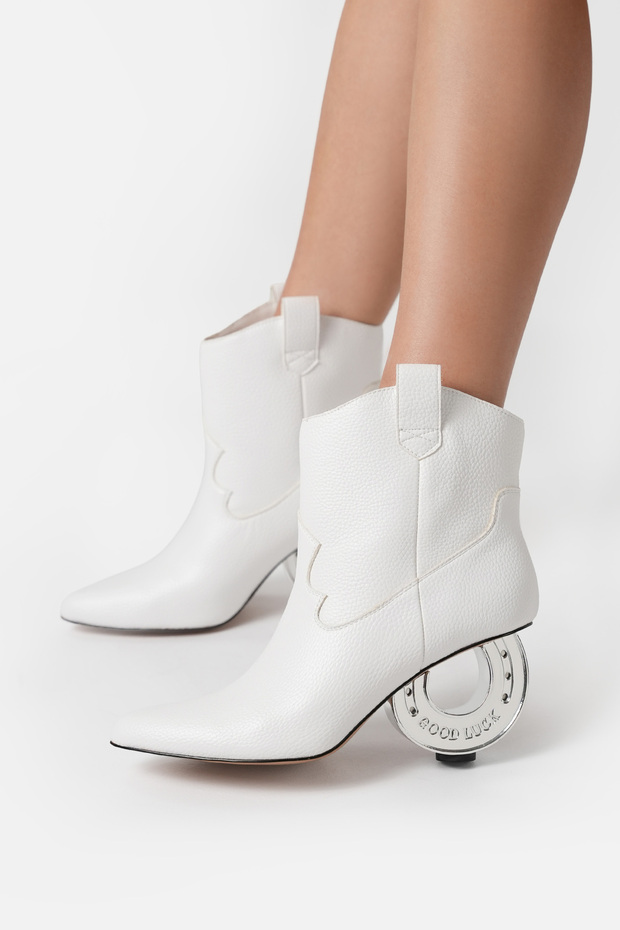 The horshoee women's optical white lucky horseshoe heeled boot