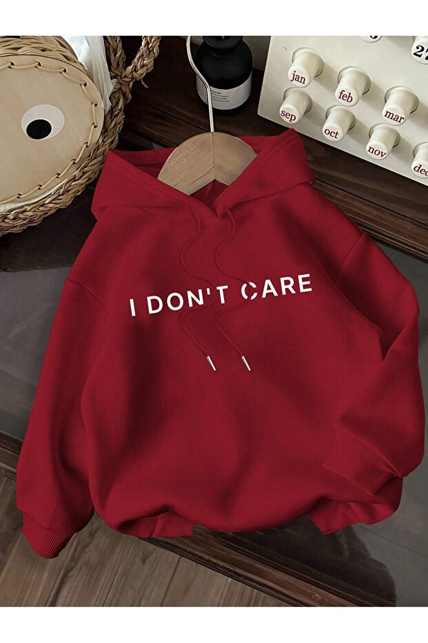 I Don'T Care Written Women's Oversized Hooded Sweatshirt