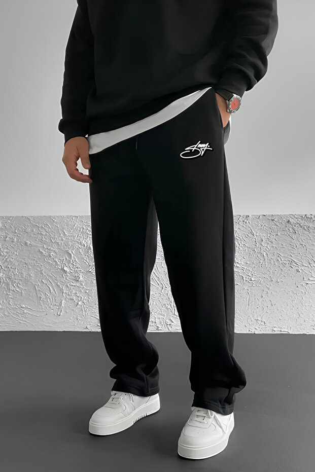 THE RULE Stüssy Curved Baskılı Baggy 3 İplik Bol Kesim Düz Paça Siyah Mevsimlik Eşofman Altı RF0555