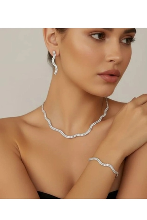 طقم مجوهرات من الزركون بتصميم موجي، أنيق وعصري