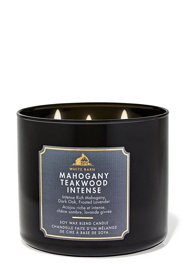 A dense candle made of mahogany and teak with three wicks - 1